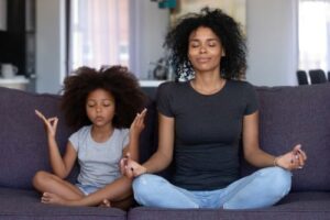 mum and child meditating